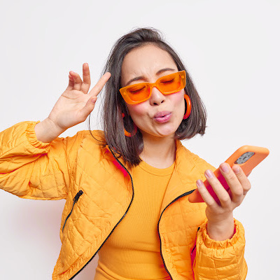 woman with orange phone